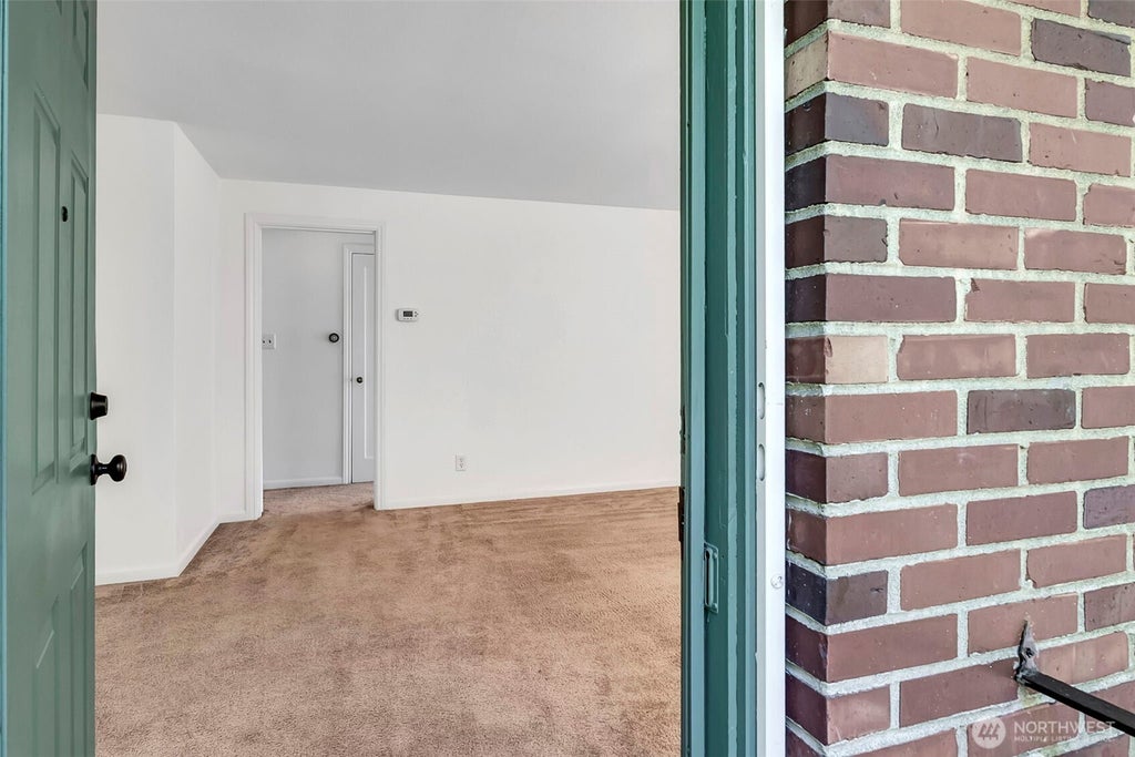 Photo of 12004 5th Ave NE AVE, Seattle, WA 98125 (MLS # 2575936)