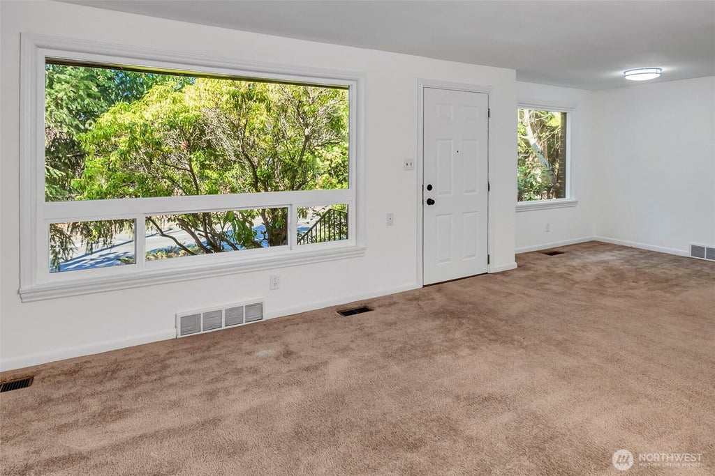 Photo of 12004 5th Ave NE AVE, Seattle, WA 98125 (MLS # 2575936)