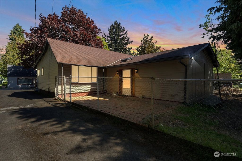 Photo of 12032 10th Avenue S, Seattle, WA 98168 (MLS # 2216279)