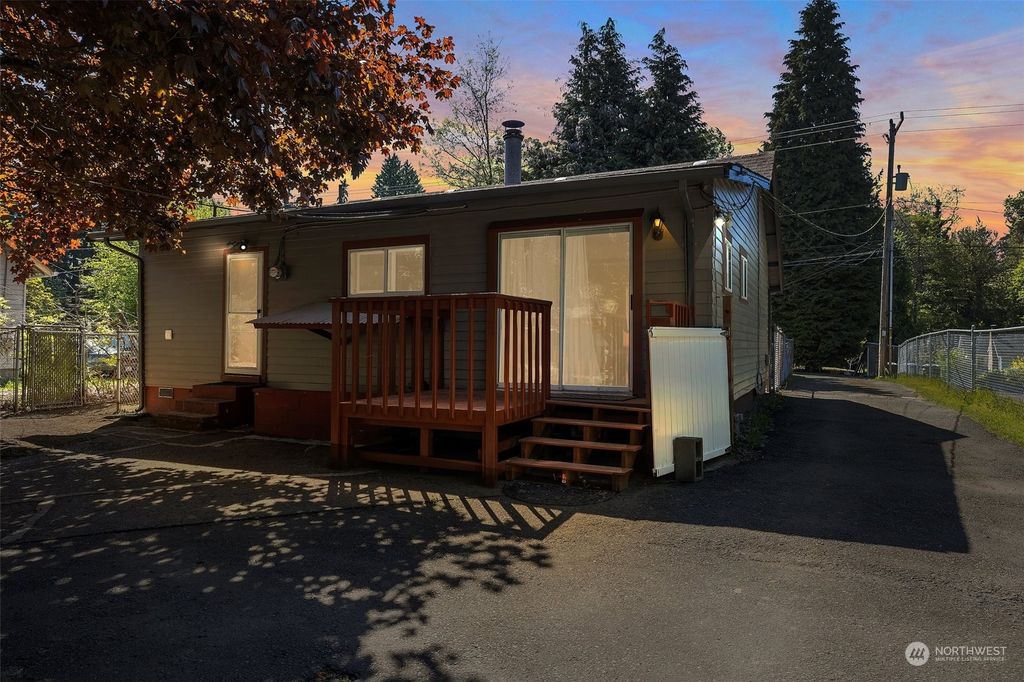 Photo of 12032 10th Avenue S, Seattle, WA 98168 (MLS # 2216279)