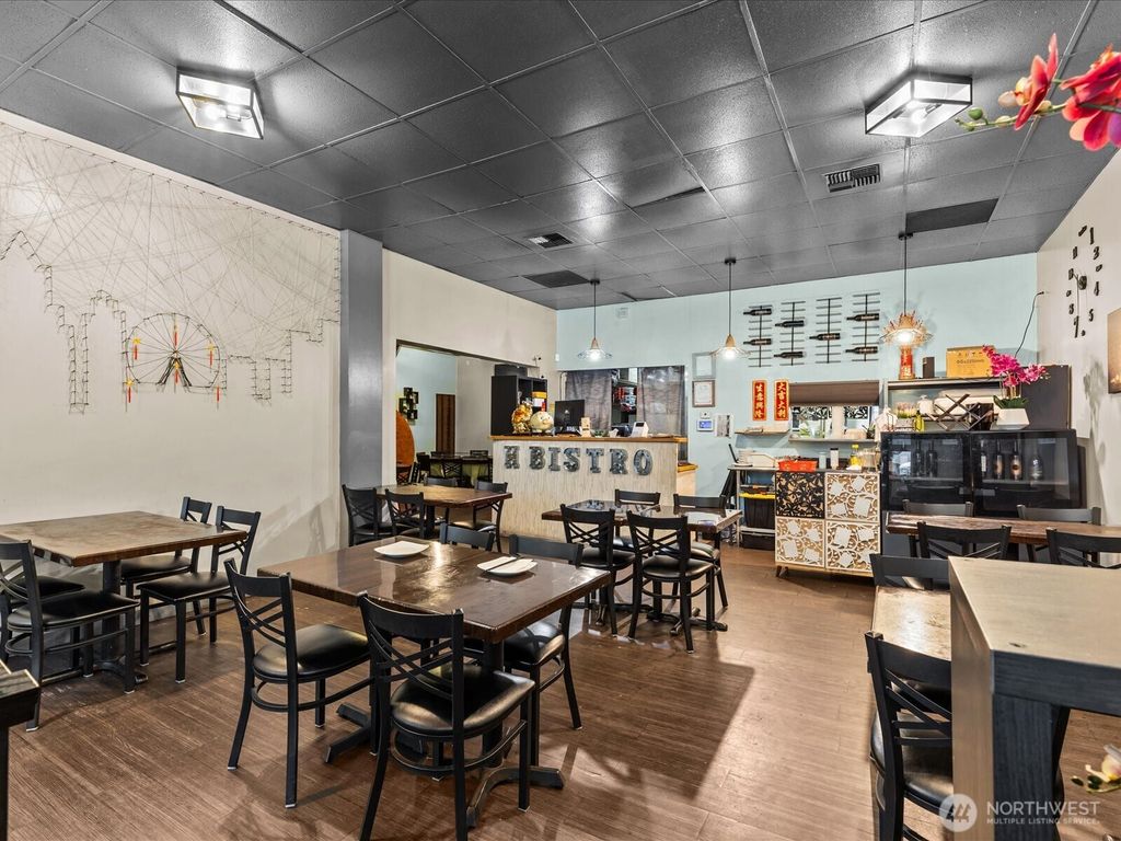 Photo of 606 BIZ OPP, Seattle, WA 98104 (MLS # 2476516)