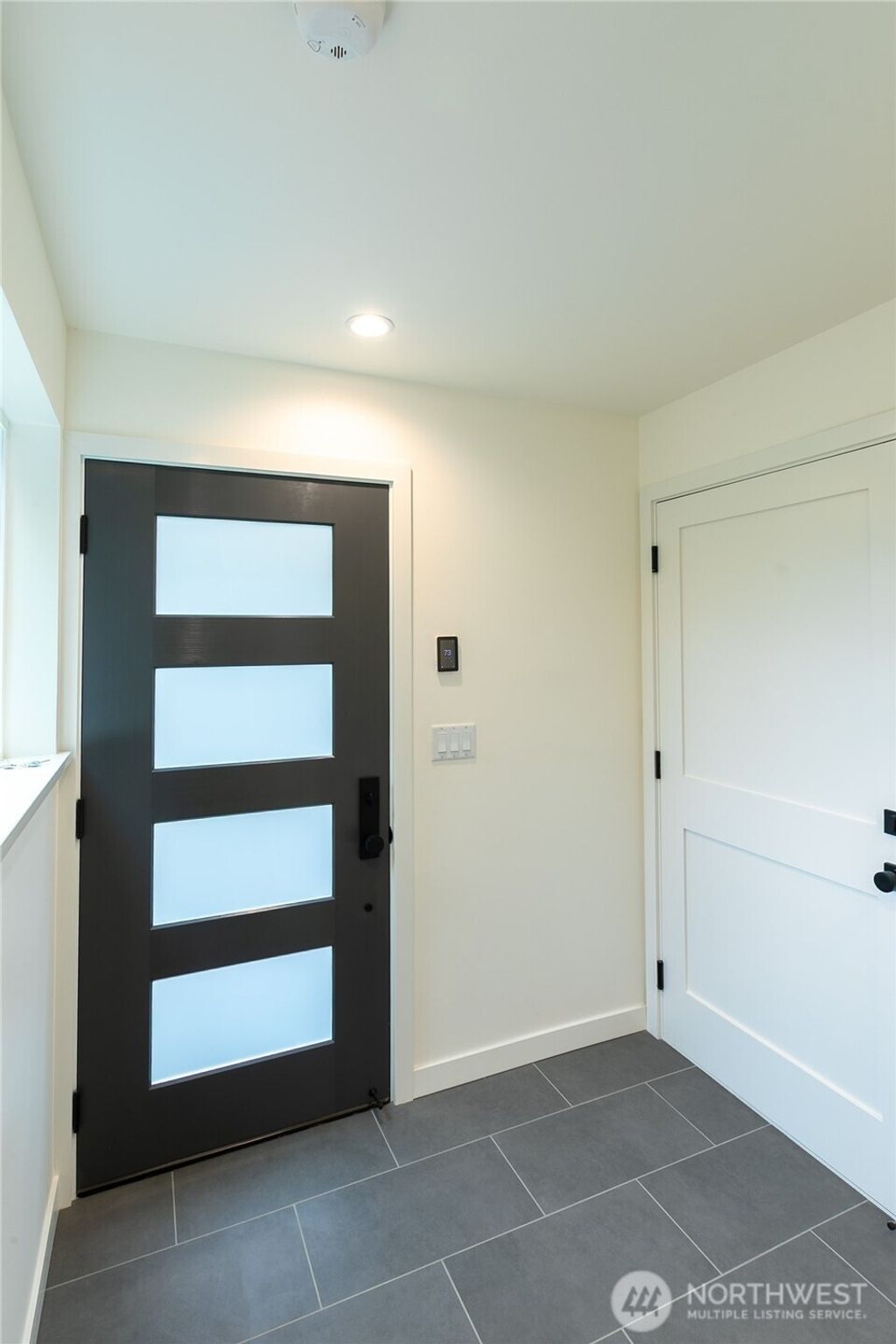 Photo of 9361 Forest Court SW, Seattle, WA 98136 (MLS # 2489402)