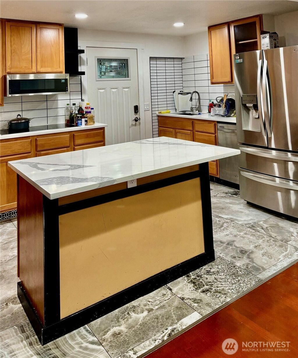 Photo of 12221 94th Place NE, Kirkland, WA 98034 (MLS # 2443803)