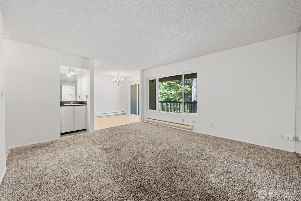 Photo of 5620 200th Street SW #A204, Lynnwood, WA 98036 (MLS # 2426068)