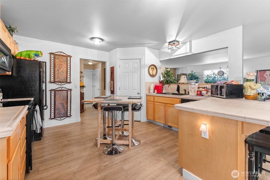 Photo of 207 Williams Boulevard NE, Orting, WA 98360 (MLS # 2487199)