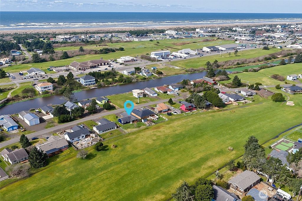 Photo of 550 Canal Drive NE, Ocean Shores, WA 98569 (MLS # 2495614)