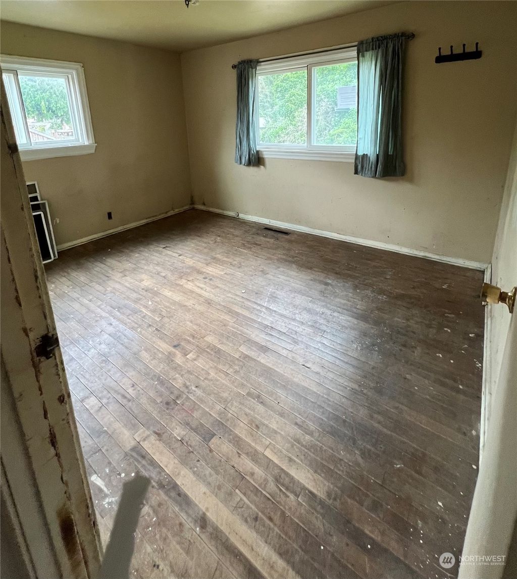 Photo of 11442 8th Avenue S, Seattle, WA 98168 (MLS # 2285786)