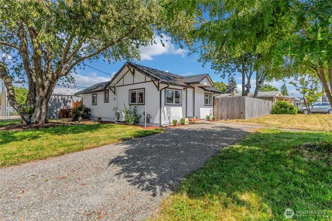 Photo of 1403 E 64th Street, Tacoma, WA 98404 (MLS # 2557152)
