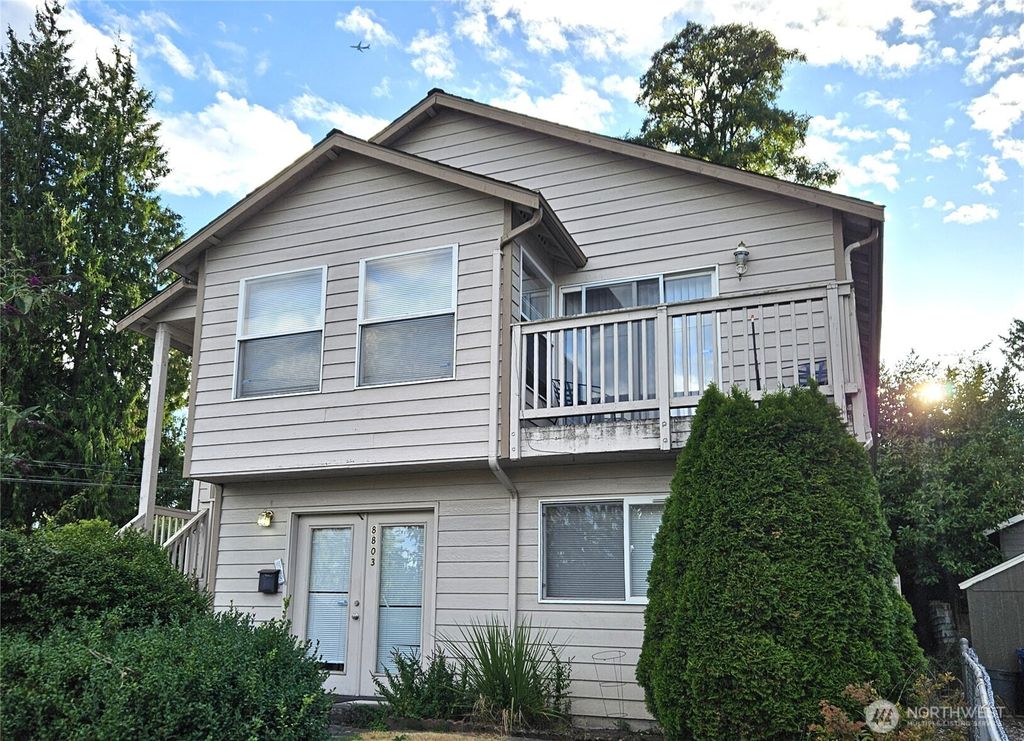 Photo of 8803 15th Avenue NE, Seattle, WA 98115 (MLS # 2422519)