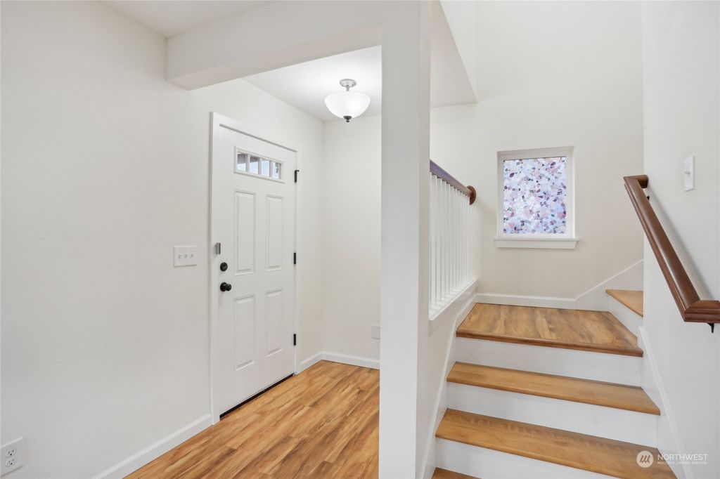 Photo of 597 SW 100th Street, Seattle, WA 98146 (MLS # 2298603)