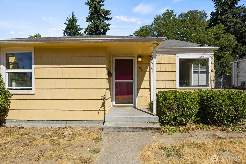Photo of 13018 7th Avenue S, Seattle, WA 98168 (MLS # 2402307)