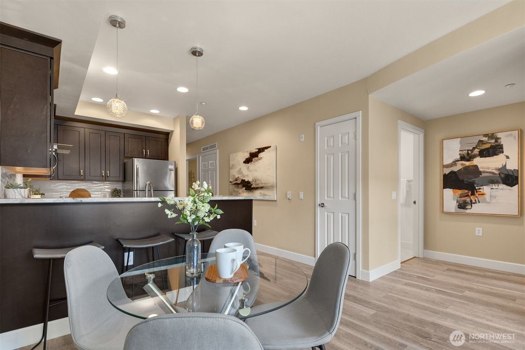 Photo of 10047 Main Street #305, Bellevue, WA 98004 (MLS # 2427948)