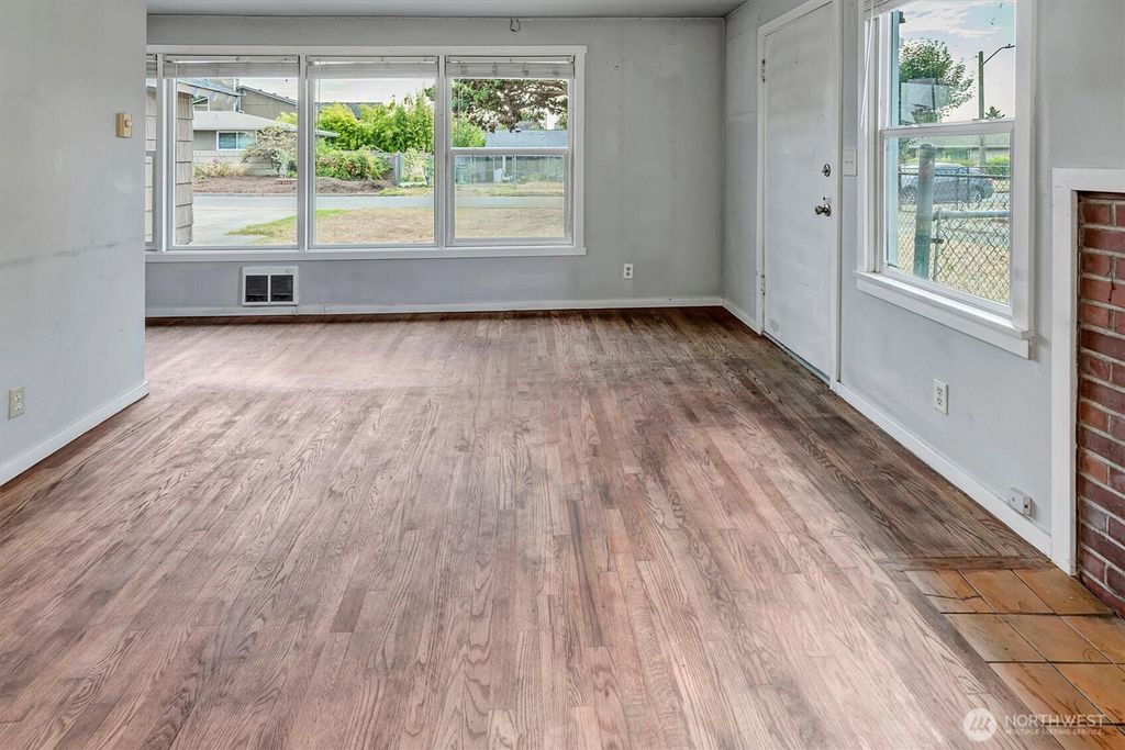 Photo of 7933 45th Avenue S, Seattle, WA 98118 (MLS # 2426106)