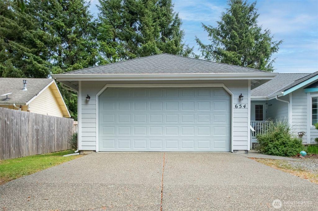Photo of 654 Woodland Loop NE, Ocean Shores, WA 98569 (MLS # 2525134)