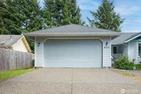 Photo of 654 Woodland Loop NE, Ocean Shores, WA 98569 (MLS # 2525134)