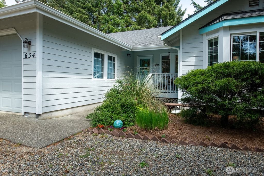 Photo of 654 Woodland Loop NE, Ocean Shores, WA 98569 (MLS # 2525134)