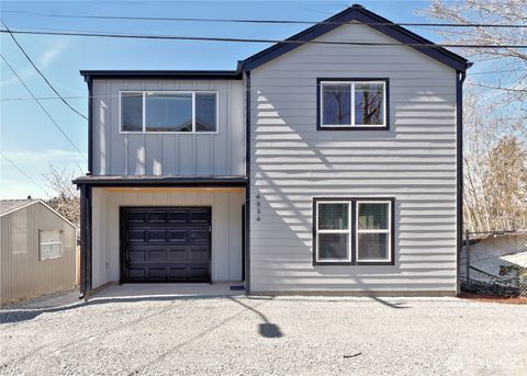 Photo of 4834 25th Avenue SW, Seattle, WA 98106 (MLS # 2505200)