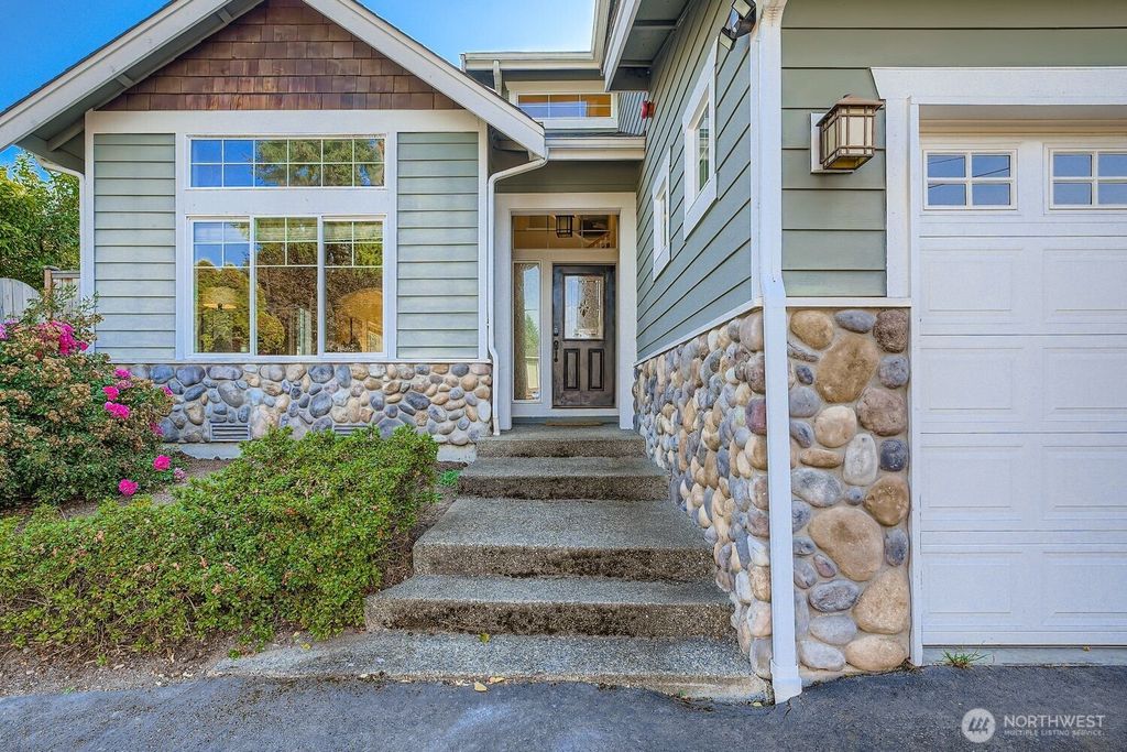 Photo of 2233 SW 104th Street, Seattle, WA 98146 (MLS # 2434153)