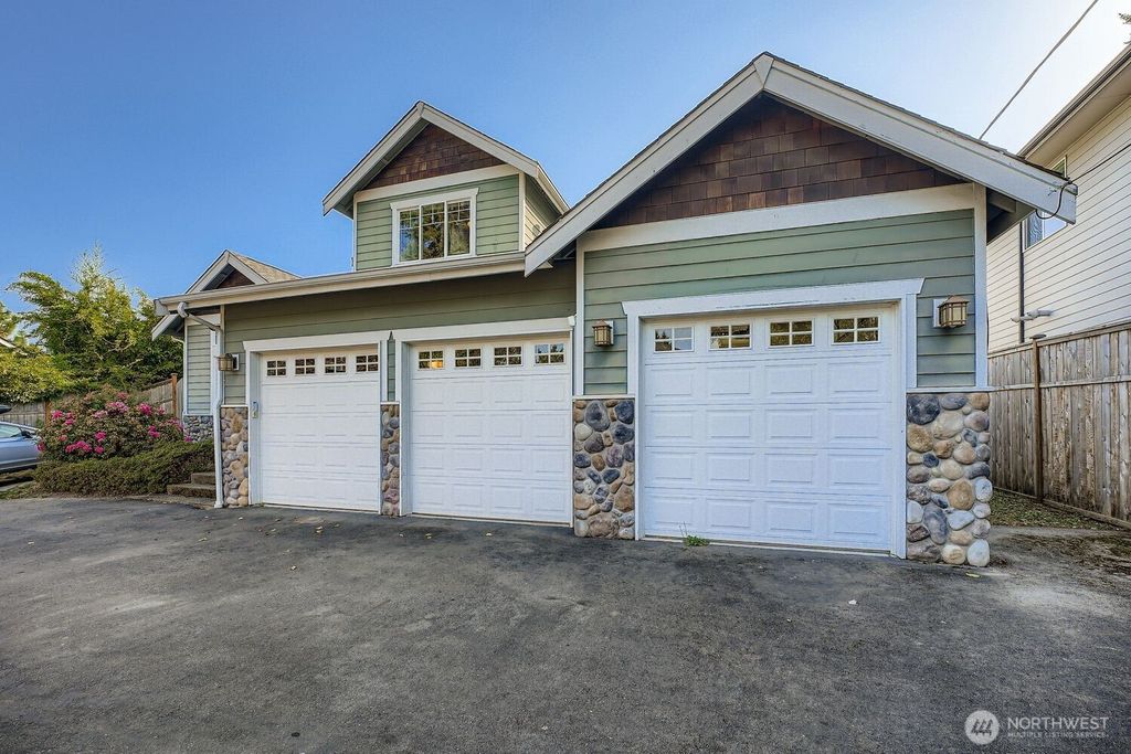 Photo of 2233 SW 104th Street, Seattle, WA 98146 (MLS # 2434153)