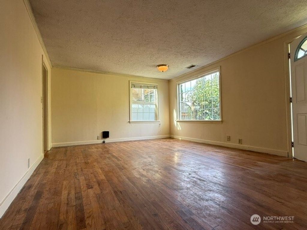 Photo of 12018 Sand Point Way NE, Seattle, WA 98125 (MLS # 2518874)