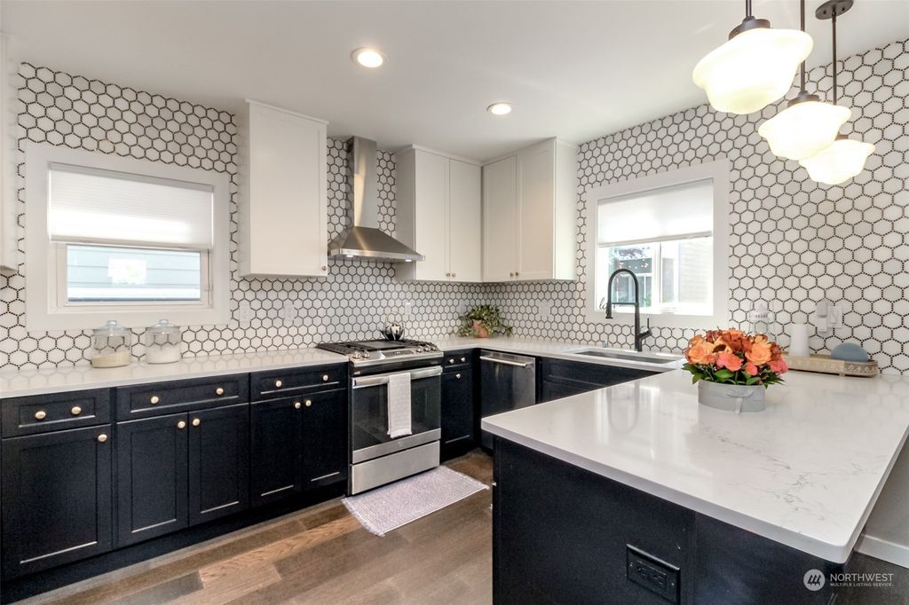 Photo of 8510 18th Avenue NW, Seattle, WA 98117 (MLS # 2072646)