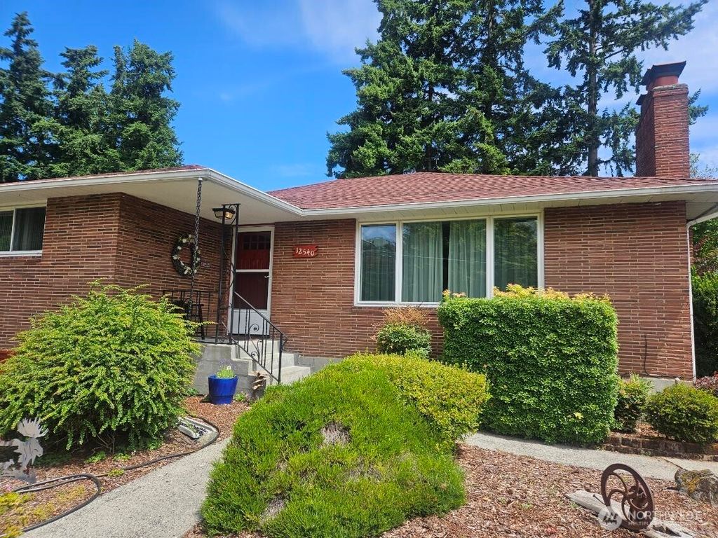 Photo of 12540 3rd Avenue NW, Seattle, WA 98177 (MLS # 2402576)