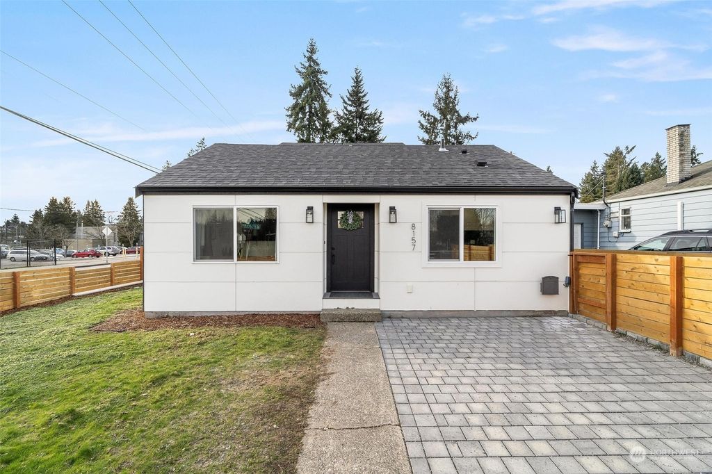 Photo of 8157 27th Avenue SW, Seattle, WA 98126 (MLS # 2192250)