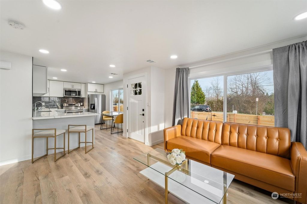 Photo of 8157 27th Avenue SW, Seattle, WA 98126 (MLS # 2192250)