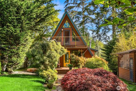 Photo of 7575 SE Madrona Drive NE, Bainbridge Island, WA 98110 (MLS # 2525475)