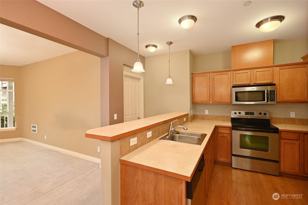 Photo of 20028 15th Avenue NE #111, Shoreline, WA 98155 (MLS # 2061319)