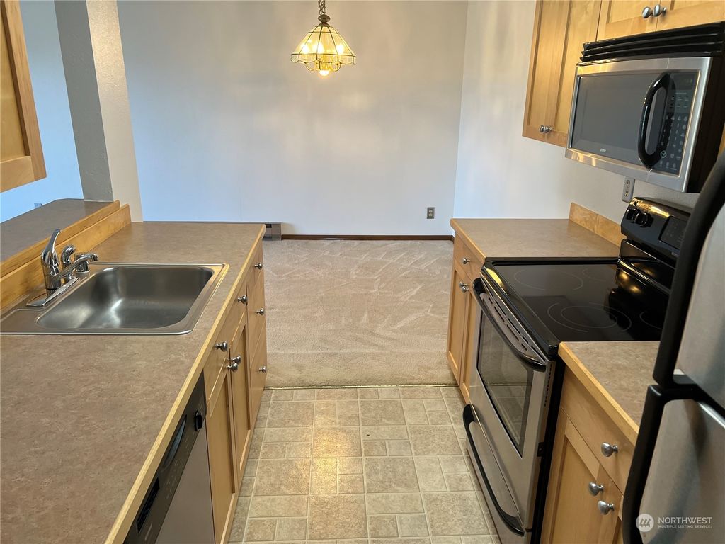 Photo of 1522 NE 175th St #406, Shoreline, WA 98155 (MLS # 2169690)