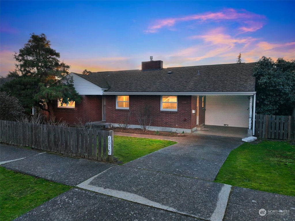 Photo of 6017 36th Avenue SW, Seattle, WA 98126 (MLS # 2326840)