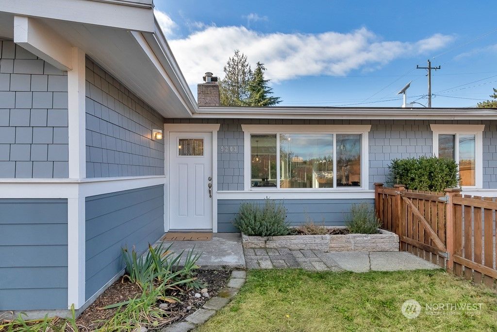 Photo of 9203 29th Avenue SW, Seattle, WA 98126 (MLS # 2045084)