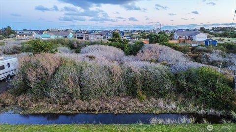 Photo of 413 N Portal Loop SW, Ocean Shores, WA 98569 (MLS # 2587928)