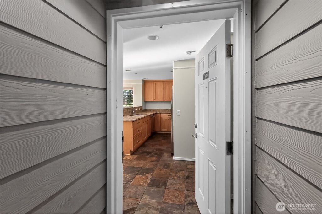 Photo of 15345 Sunwood Boulevard #D104, Tukwila, WA 98188 (MLS # 2479435)