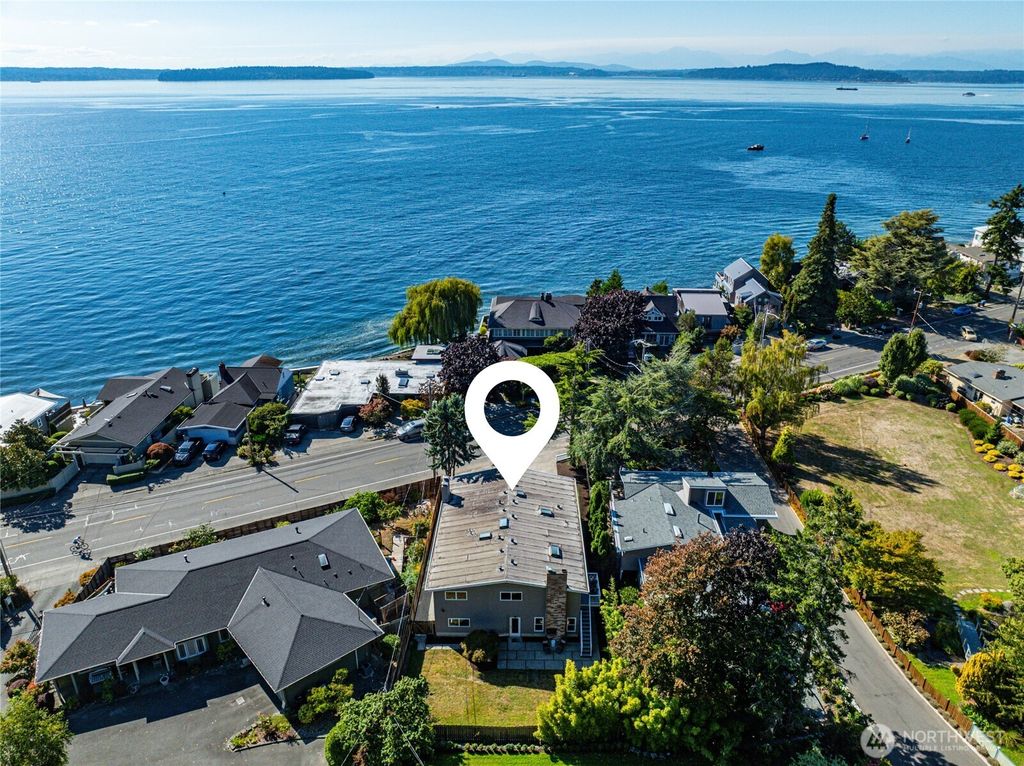 Photo of 4878 Beach Drive SW, Seattle, WA 98116 (MLS # 2436103)