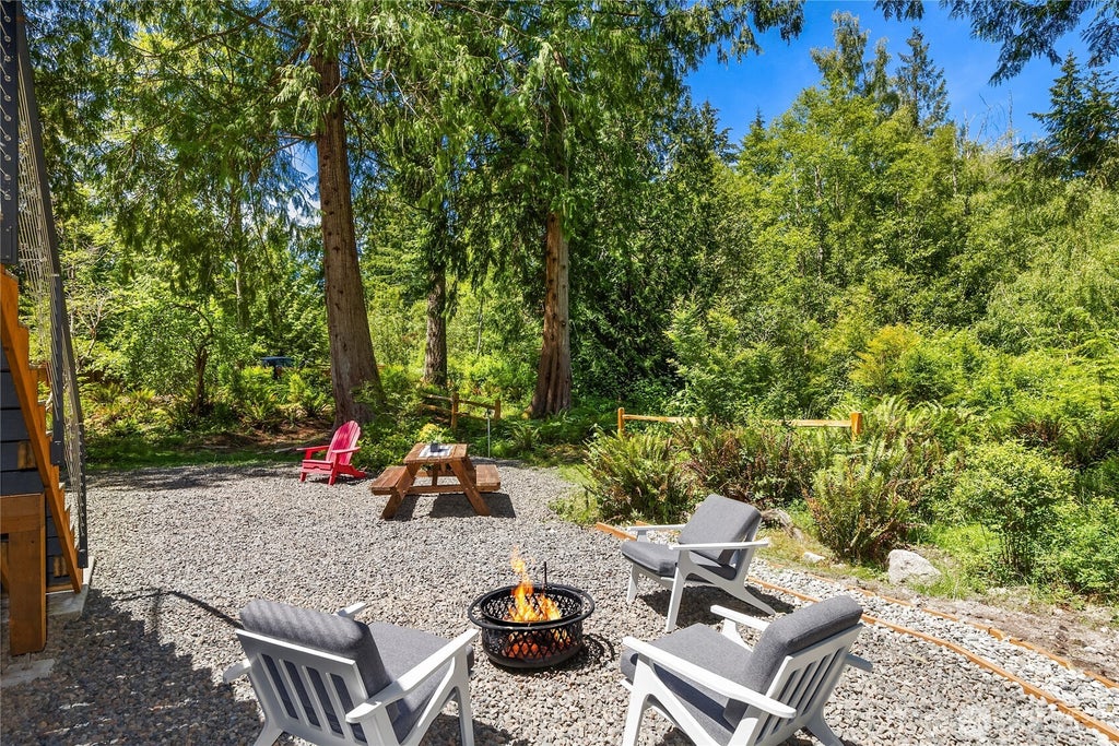 Photo of 10399 NE Pine Way, Bainbridge Island, WA 98110 (MLS # 2538939)
