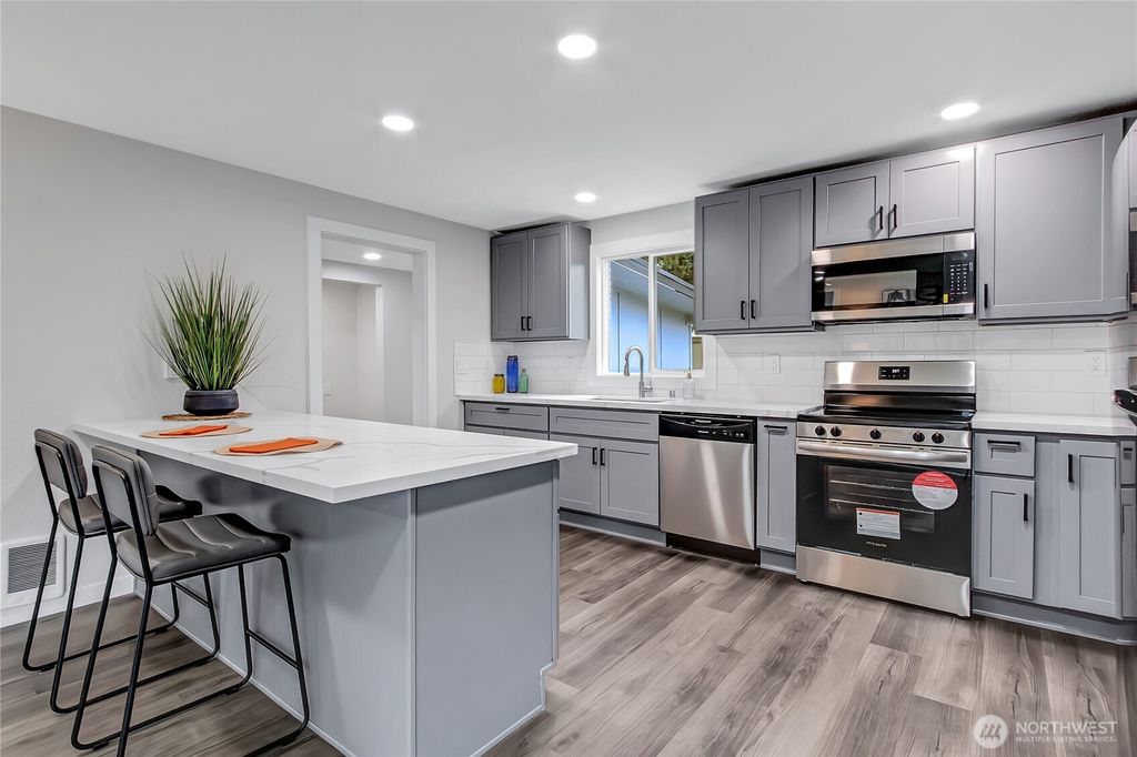 Photo of 2804 S 144th Street, SeaTac, WA 98168 (MLS # 2352727)