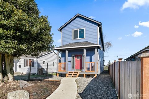 Photo of 825 E 55th Street, Tacoma, WA 98404 (MLS # 2472198)