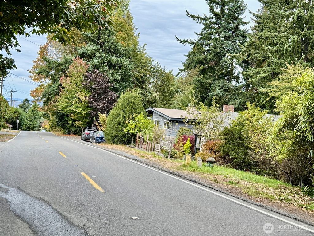 Photo of 9104 28th Avenue NW, Seattle, WA 98117 (MLS # 2438650)