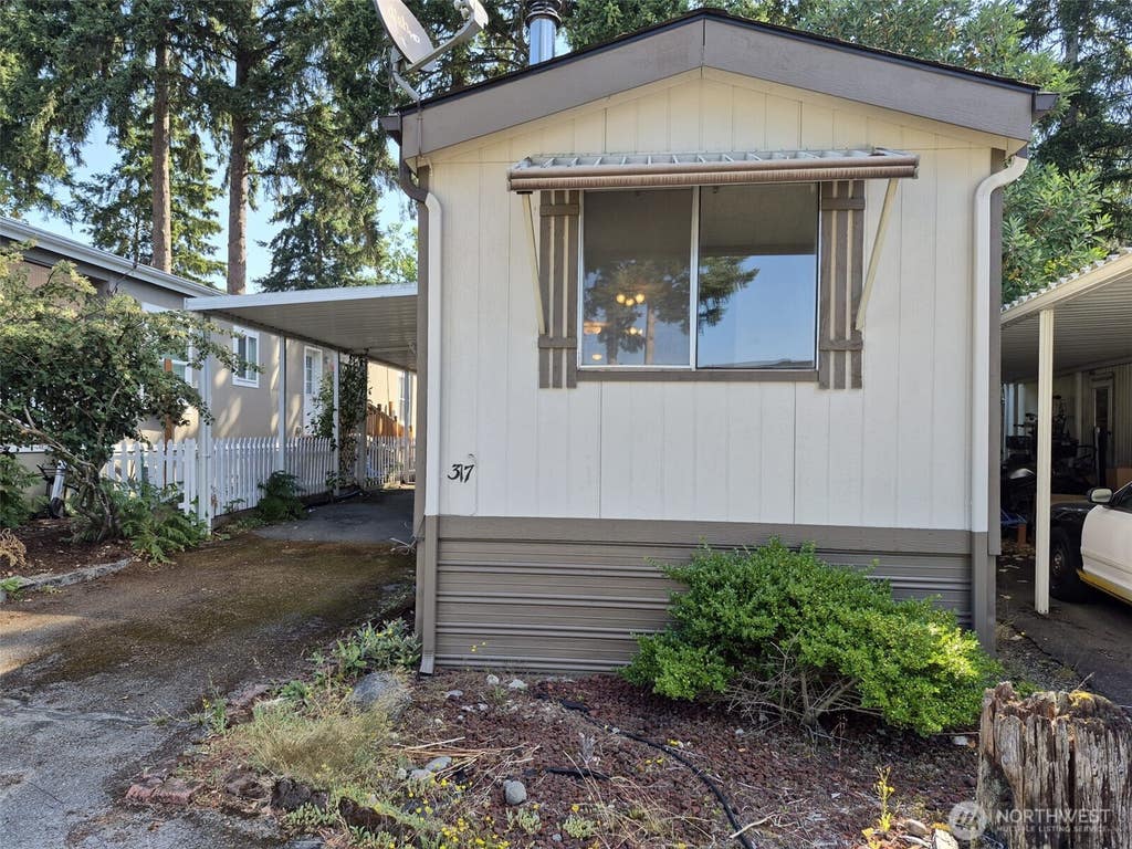 Photo of 7301 NE 175th Street #317, Kenmore, WA 98028 (MLS # 2557308)