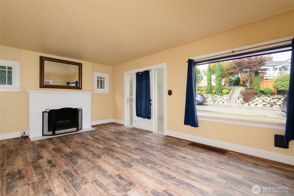Photo of 4038 34th Avenue SW, Seattle, WA 98126 (MLS # 2426726)