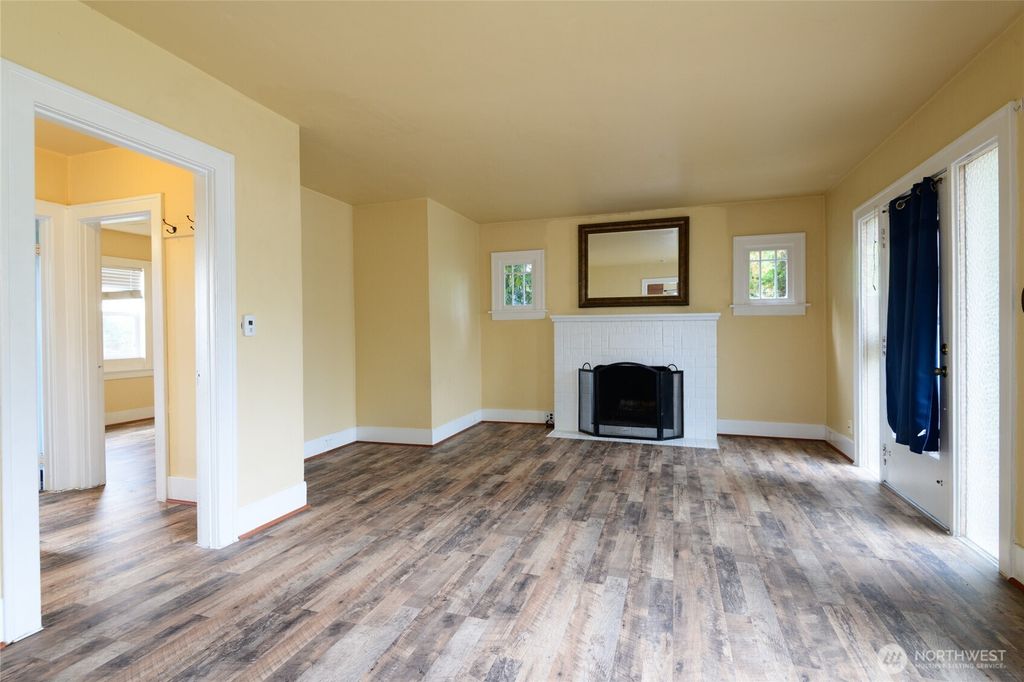 Photo of 4038 34th Avenue SW, Seattle, WA 98126 (MLS # 2426726)
