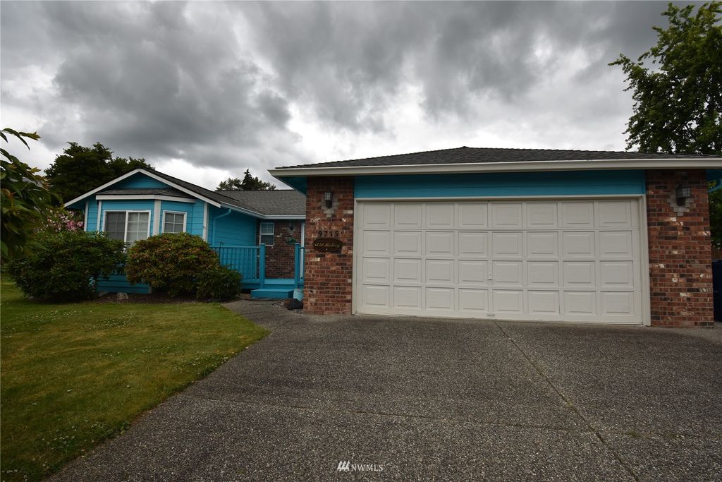 Photo of 9715 63rd Drive NE, Marysville, WA 98270 (MLS # 1970019)