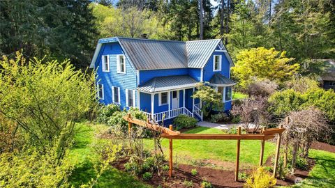 Photo of 10472 NE Sunrise Bluff Lane, Bainbridge Island, WA 98110 (MLS # 2509406)