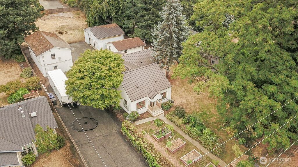 Photo of 12048 10th Avenue S, Burien, WA 98168 (MLS # 2417413)