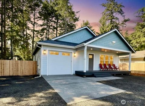 Photo of 611 Weatherwax Loop NE, Ocean Shores, WA 98569 (MLS # 2435043)