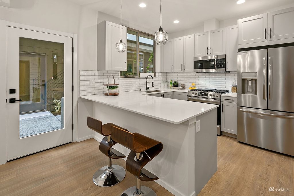 Photo of 8015 Mary Avenue NW #D, Seattle, WA 98117 (MLS # 1979554)