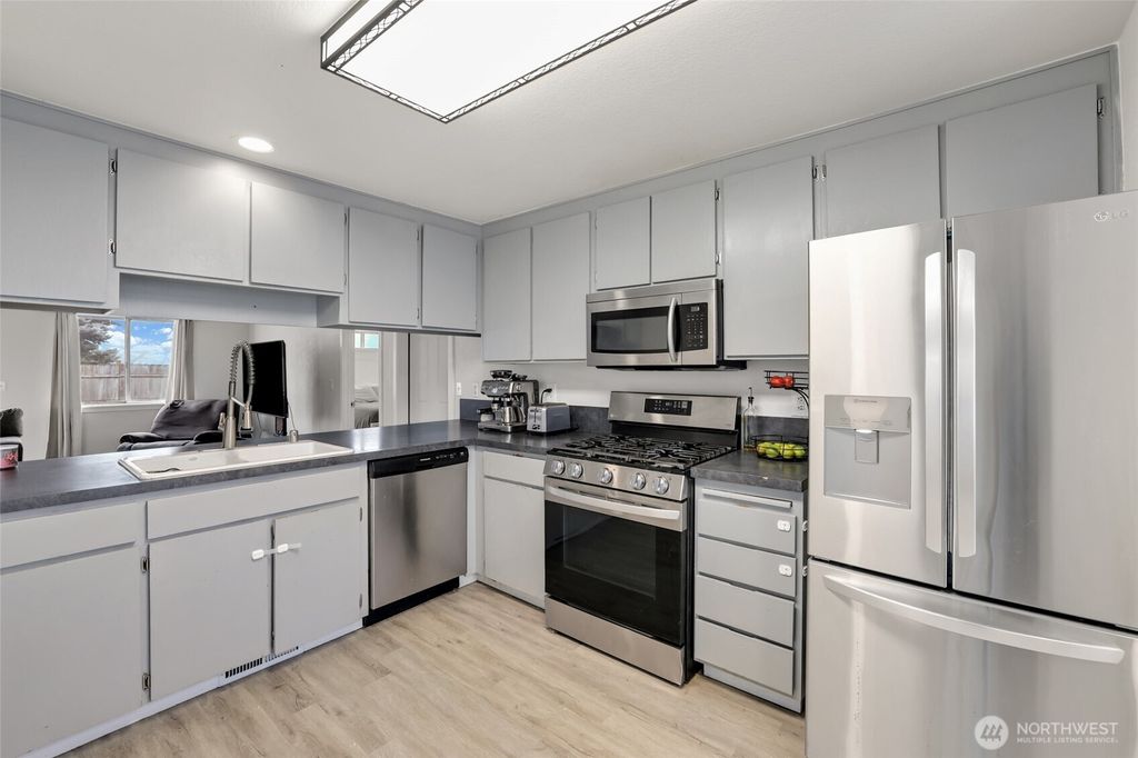 Photo of 3933 Woodlawn Drive SE, Olympia, WA 98501 (MLS # 2465757)