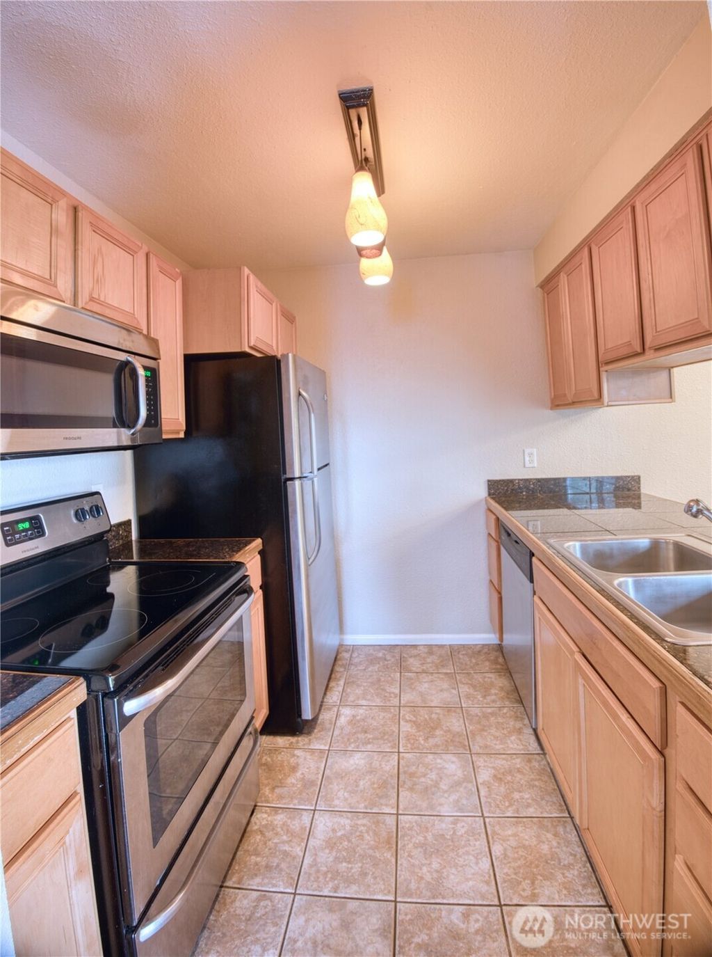 Photo of 3233 NE 12th Street #301, Renton, WA 98056 (MLS # 2448412)